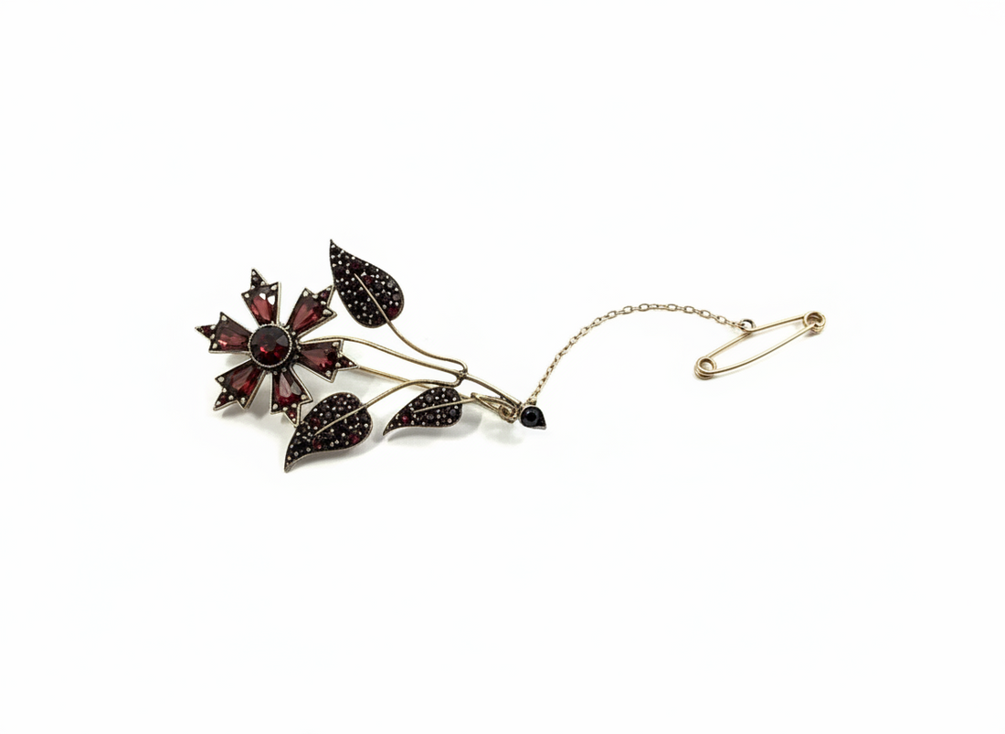 Rolled gold Floral brooch with garnet
