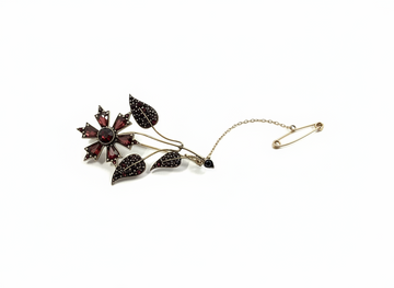 Rolled gold Floral brooch with garnet