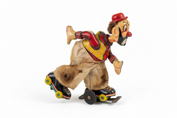 TPS 1950’s Tin Litho Wind Up Rollerskating Clown