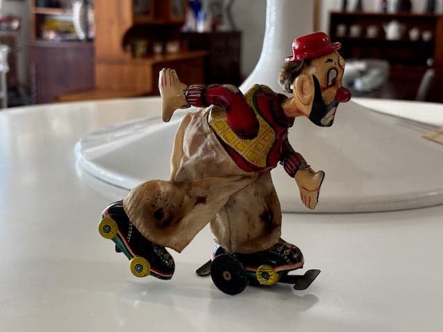 TPS 1950’s Tin Litho Wind Up Rollerskating Clown - Industry Vintage