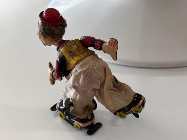 TPS 1950’s Tin Litho Wind Up Rollerskating Clown - Industry Vintage